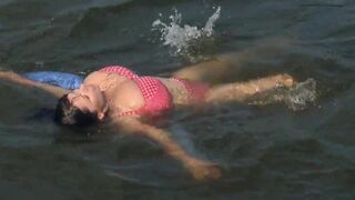 Busty Mother Having Too Much Beach Fun
