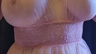 Petite MILF unveils huge breasts