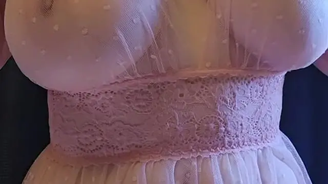 Petite MILF unveils huge breasts